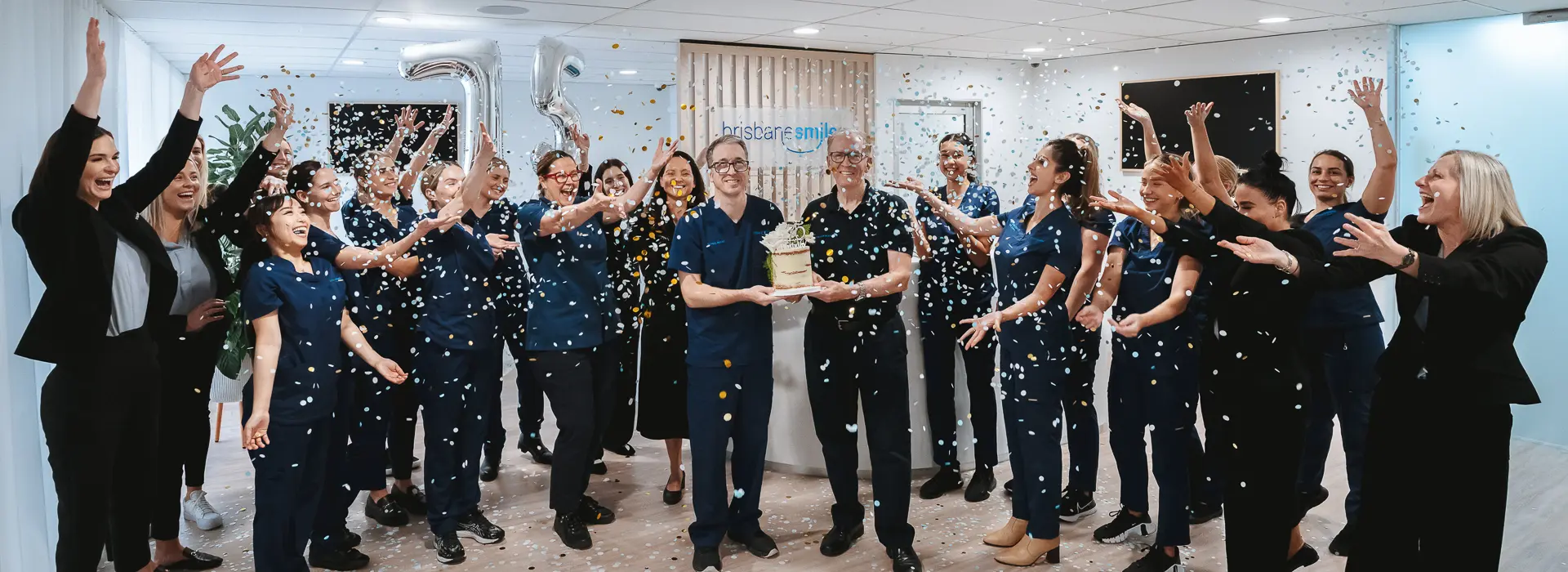 brisbane smiles dental team celebrating ove r75 years history