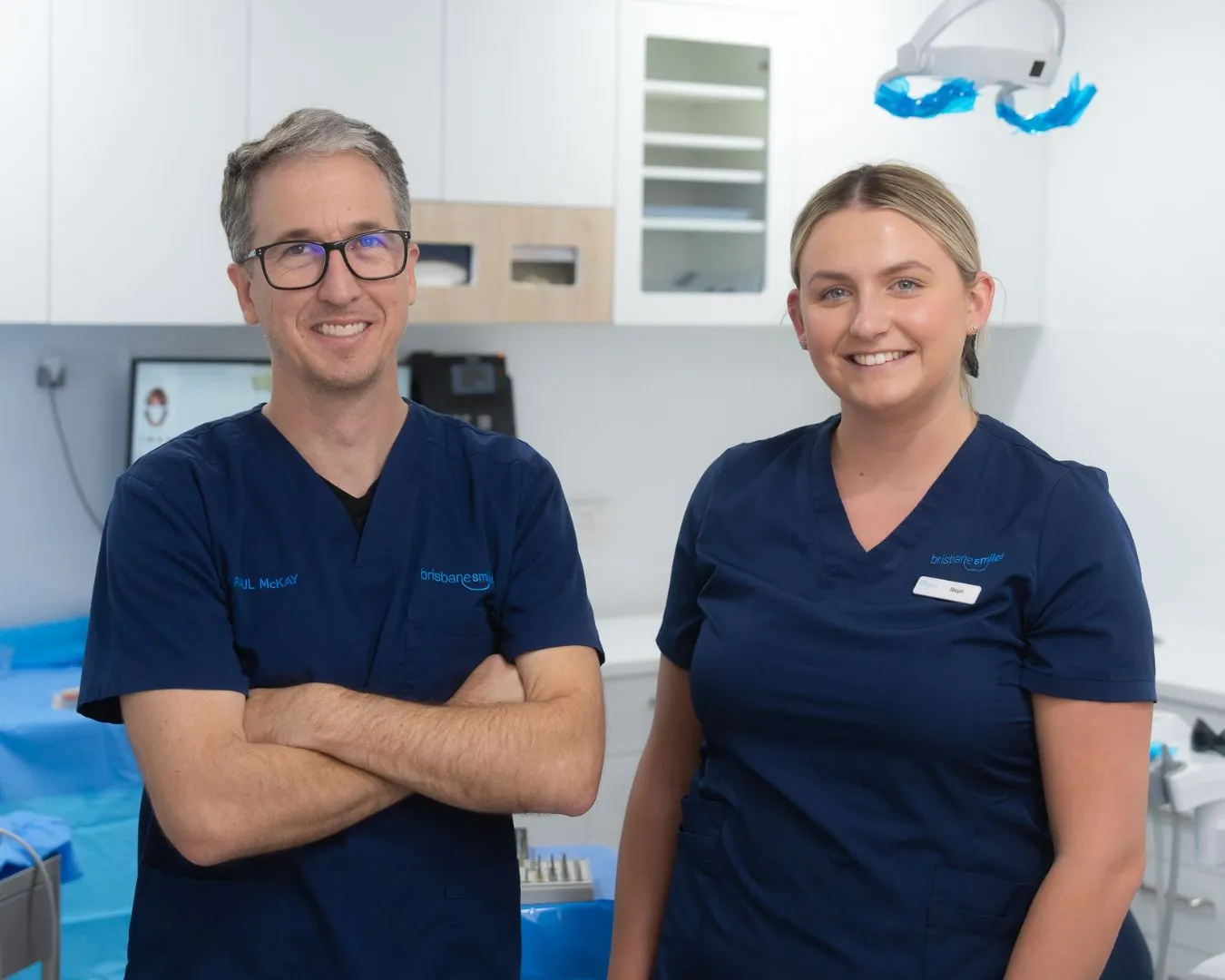 dentist and dental assistant at brisbane smiles surgery